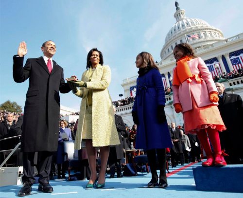 Barack H. Obama is sworn in as the 44th president of the United States as his wife Michelle Obama holds the Bible and their daughters Malia Obama and Sasha Obama look on, on the West Front of the Capitol January 20, 2009 in Washington, DC. (Chuck Kennedy-Pool/Getty Images) 